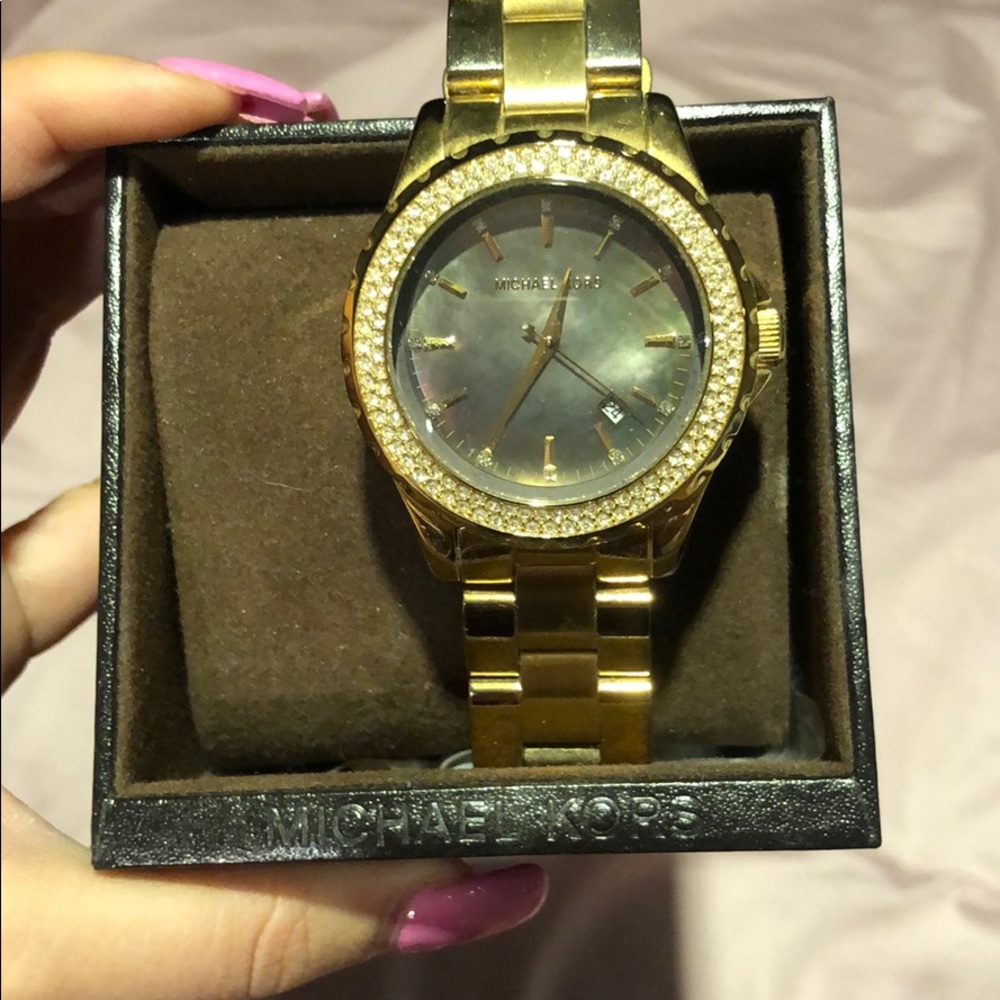 Micheal Kors gold watch with pearl face great